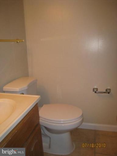 7404 Braddock Road Annandale, VA 22003 - Photo 15 of 15 a white toilet sitting next to a shower