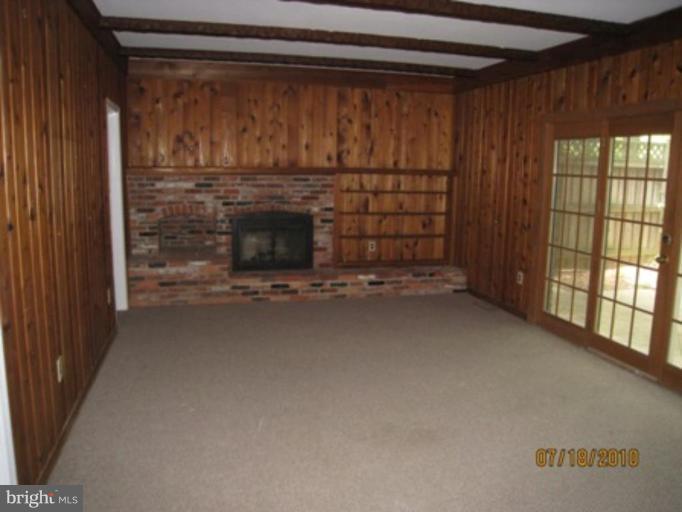 7404 Braddock Road Annandale, VA 22003 - Photo 5 of 15 a view of room with window and fireplace