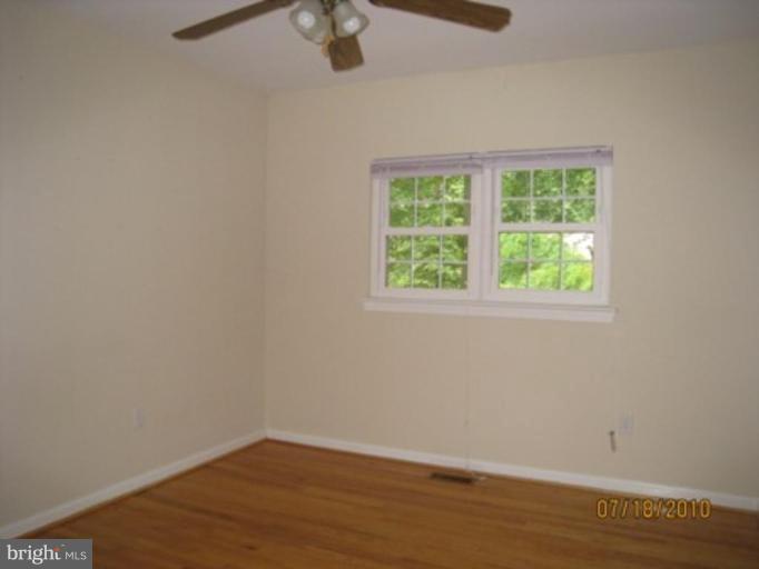 7404 Braddock Road Annandale, VA 22003 - Photo 10 of 15 an empty room with a window