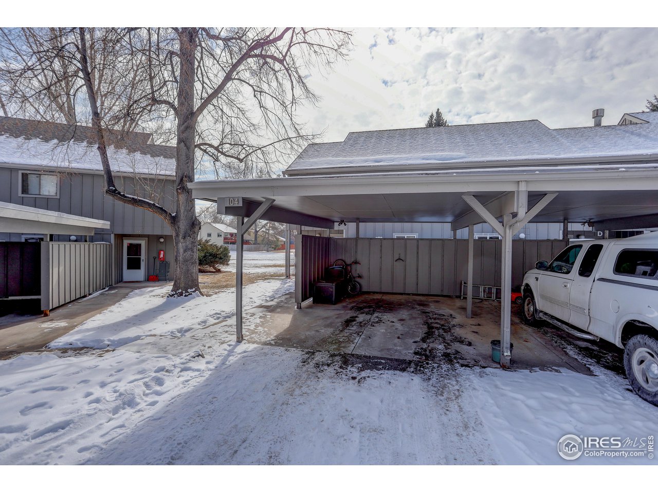 809 East Drake Road, Unit 104 Fort Collins, CO 80525 - Photo 33 of 36 Carport Near Front Entrance