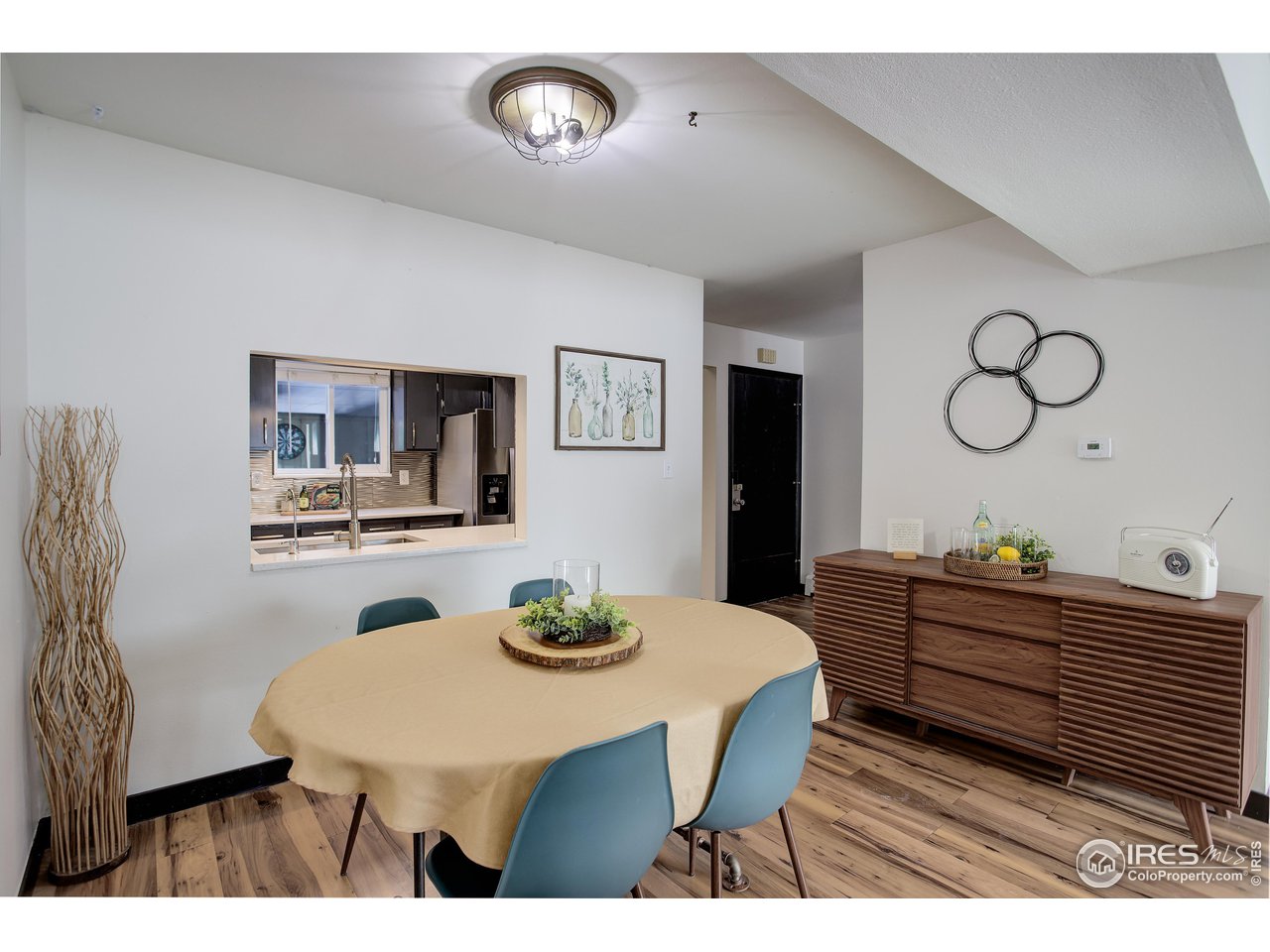 809 East Drake Road, Unit 104 Fort Collins, CO 80525 - Photo 7 of 36 Handy Pass Through to Kitchen