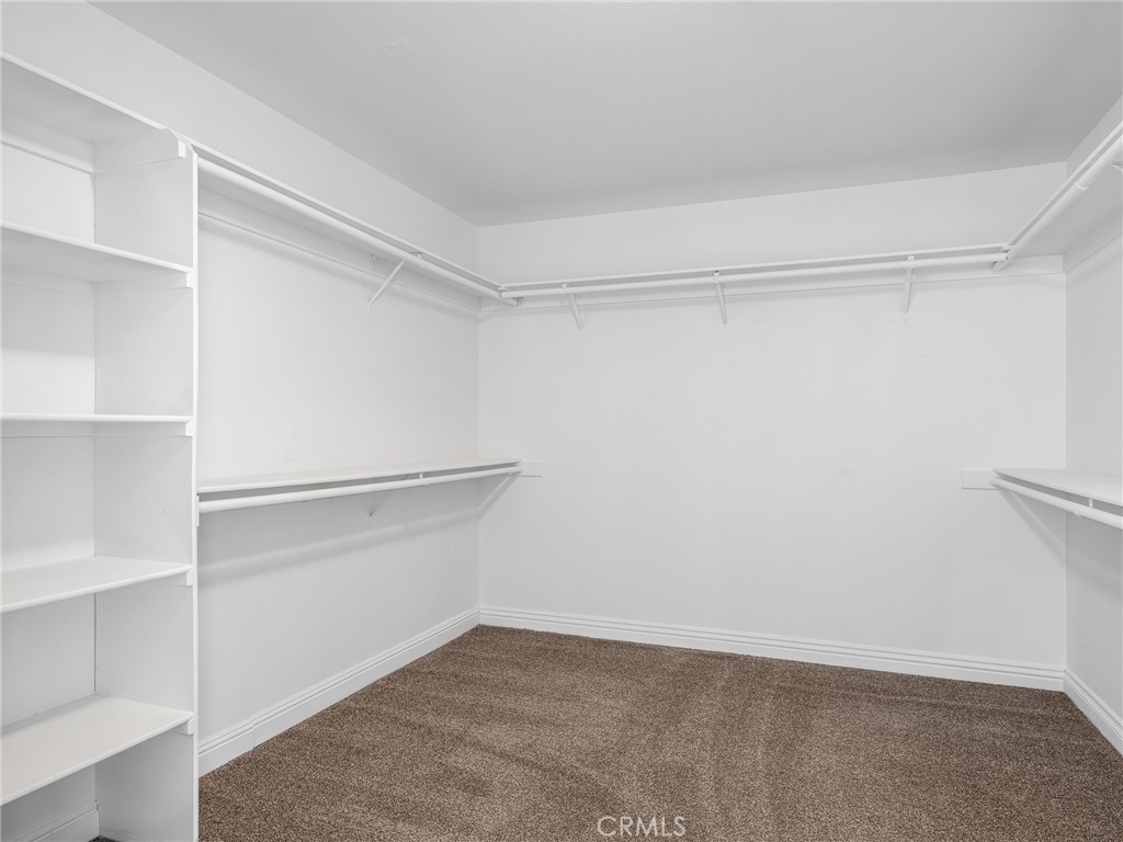 8135 Winmar Road Hesperia, CA 92344 - Photo 26 of 52 a view of an empty walk in closet