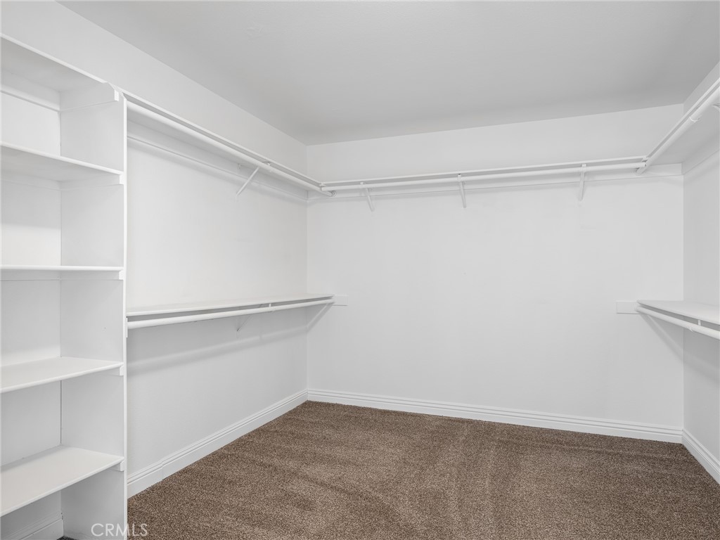 8135 Winmar Road Hesperia, CA 92344 - Photo 26 of 52 a view of an empty walk in closet