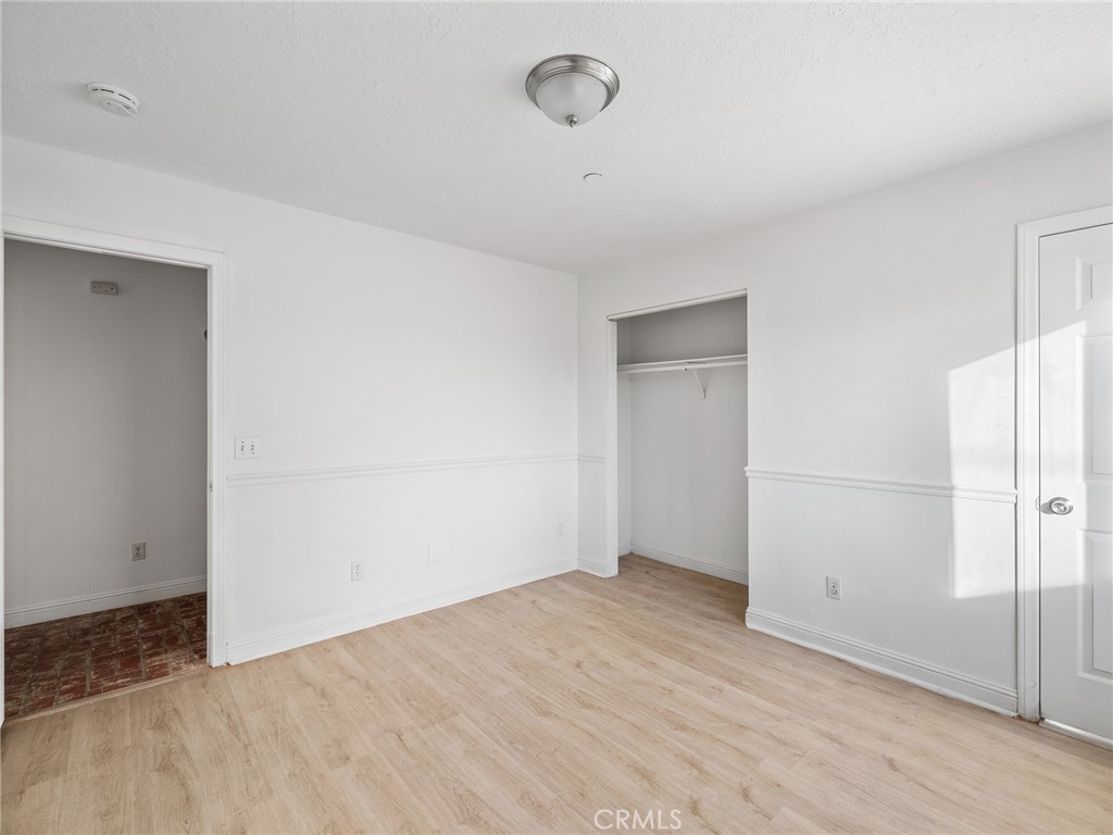 8135 Winmar Road Hesperia, CA 92344 - Photo 35 of 52 an empty room with a empty space and a window