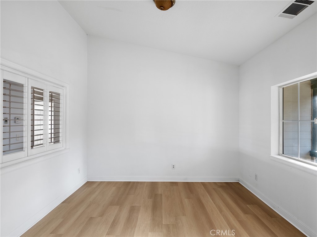 8135 Winmar Road Hesperia, CA 92344 - Photo 9 of 52 an empty room with a window