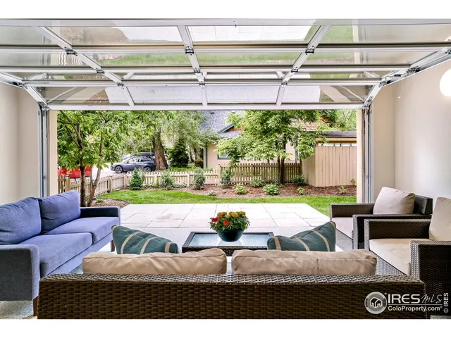 a living room with a couch and a table