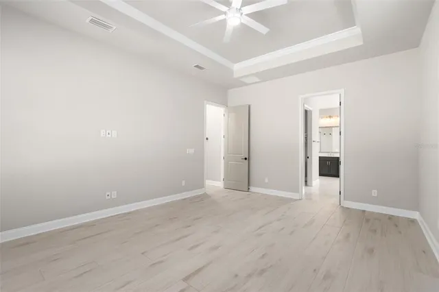 a bathroom with a shower and a sink