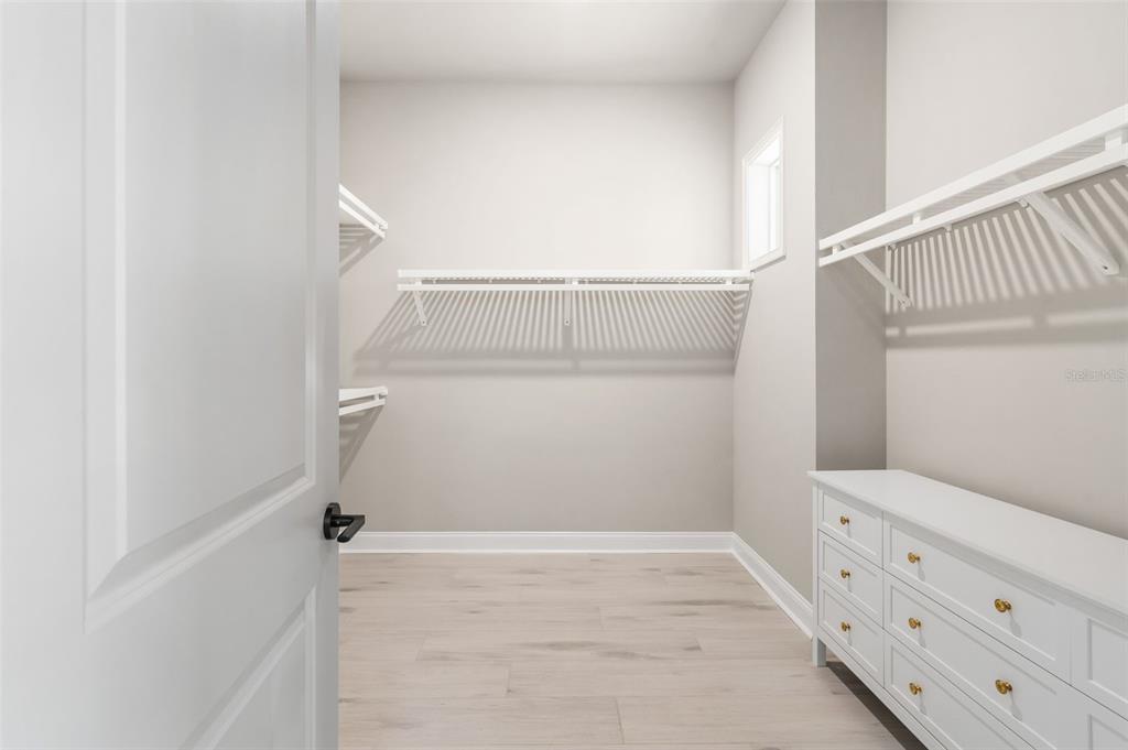 3474 Southwest 109 Drive Gainesville, FL 32608 - Photo 27 of 60 a view of an empty walk in closet