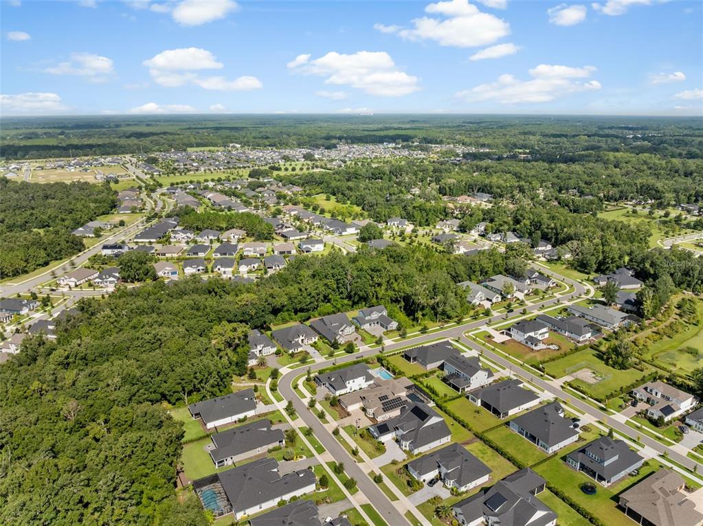 3474 Southwest 109 Drive Gainesville, FL 32608 - Photo 52 of 60 an aerial view of residential houses with outdoor space