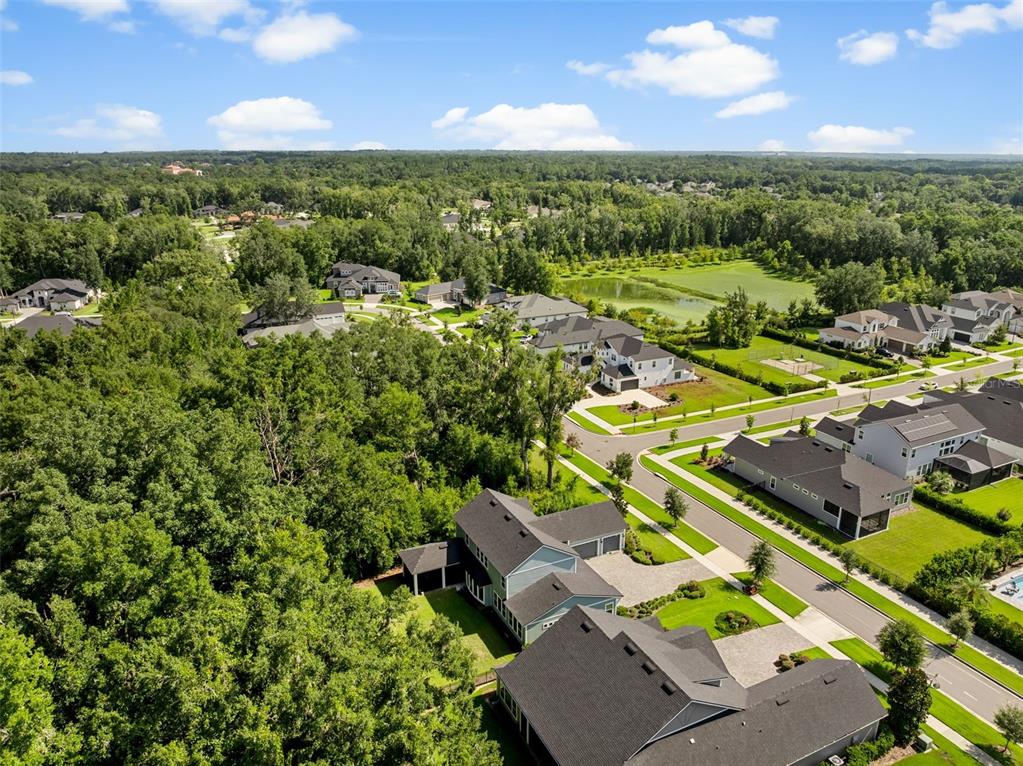 3474 Southwest 109 Drive Gainesville, FL 32608 - Photo 54 of 60 an aerial view of residential houses with outdoor space and city view