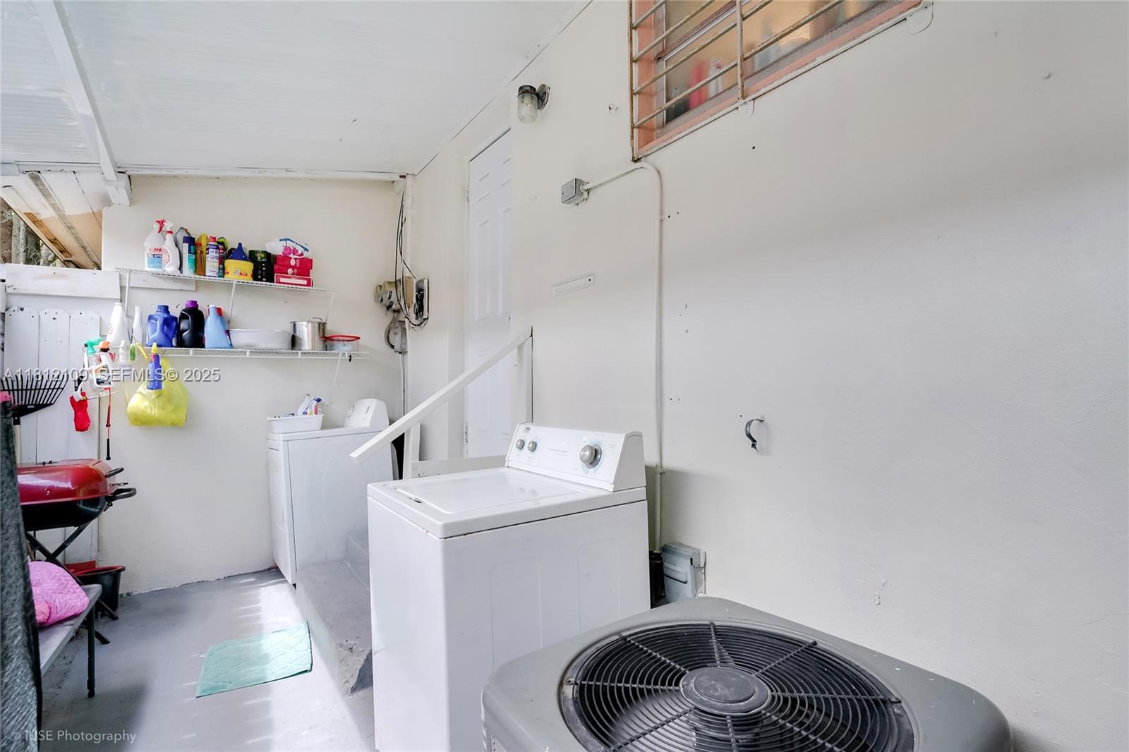 901 Southwest 34th Avenue Miami, FL 33135 - Photo 11 of 18 a utility room with dryer and washer