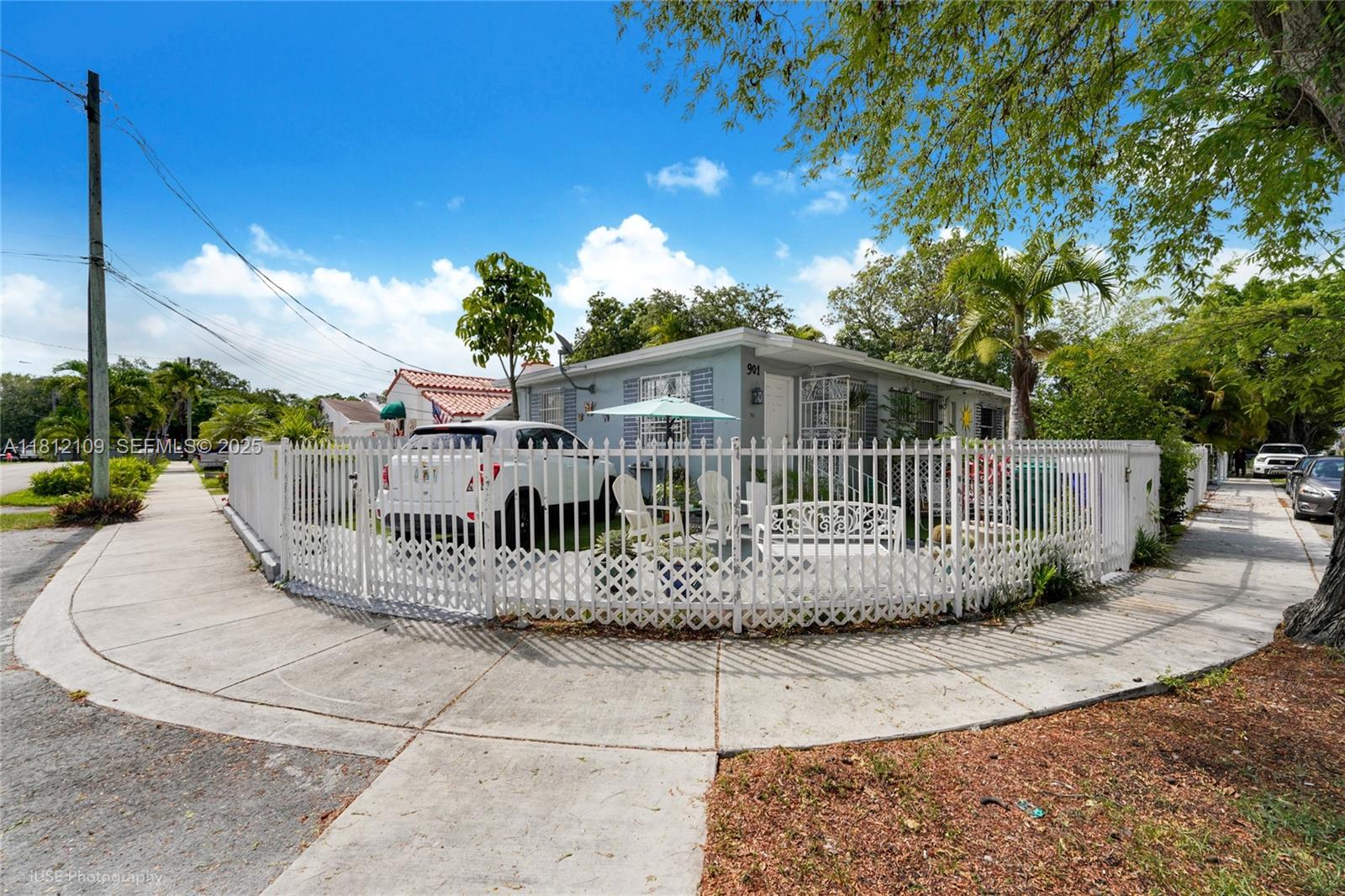 901 Southwest 34th Avenue Miami, FL 33135 - Photo 3 of 18 a view of a wooden deck with a house in the background