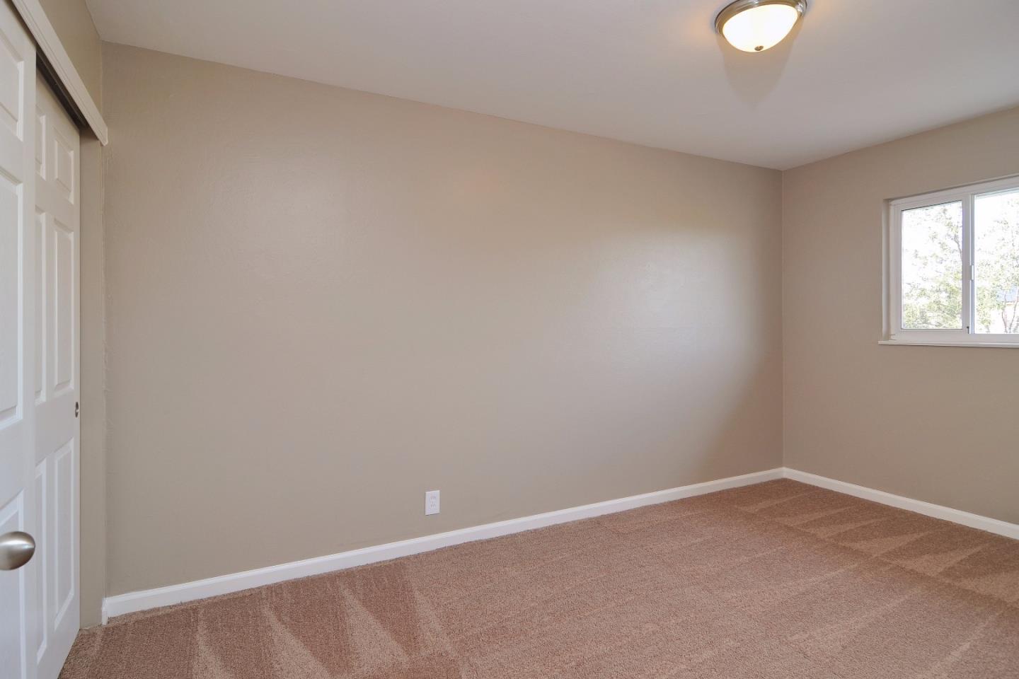 2994 Rustic Drive San Jose, CA 95124 - Photo 11 of 22 a view of an empty room with a window