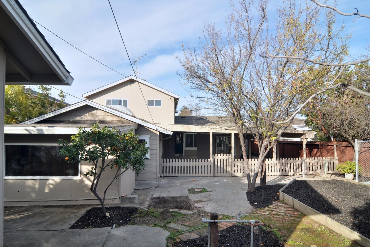 2994 Rustic Drive San Jose, CA 95124 - Photo 22 of 22 a front view of a house with garage