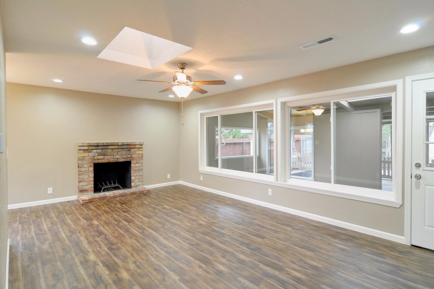 2994 Rustic Drive San Jose, CA 95124 - Photo 6 of 22 a view of an empty room with window and fire place