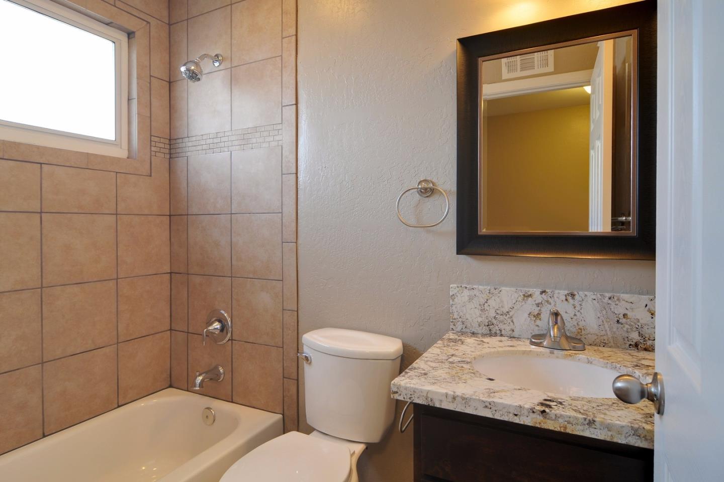 2994 Rustic Drive San Jose, CA 95124 - Photo 9 of 22 a bathroom with a sink a toilet and shower