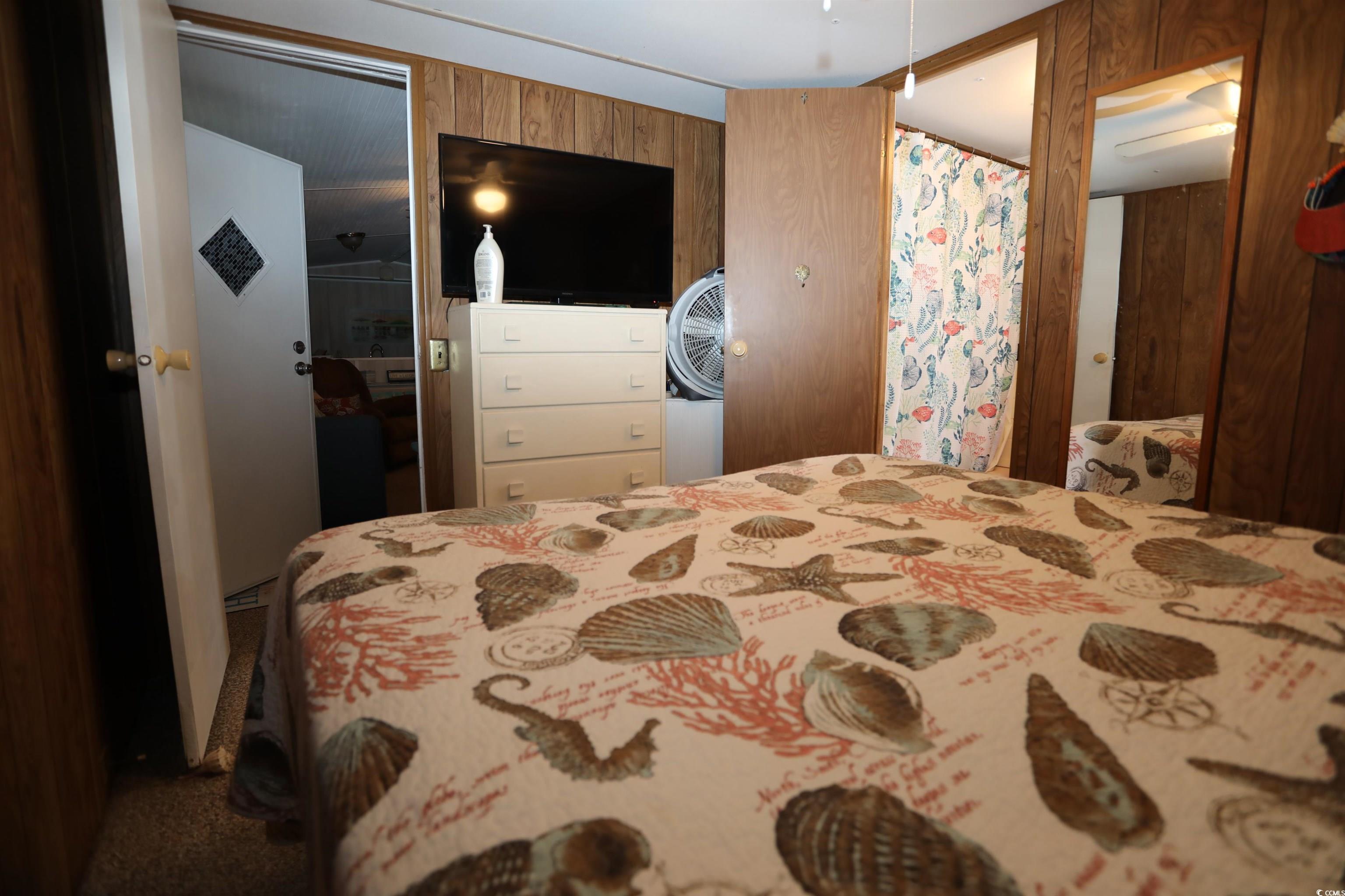 724 1st Street Murrells Inlet, SC 29576 - Photo 7 of 18 Sunroom / solarium featuring carpet flooring
