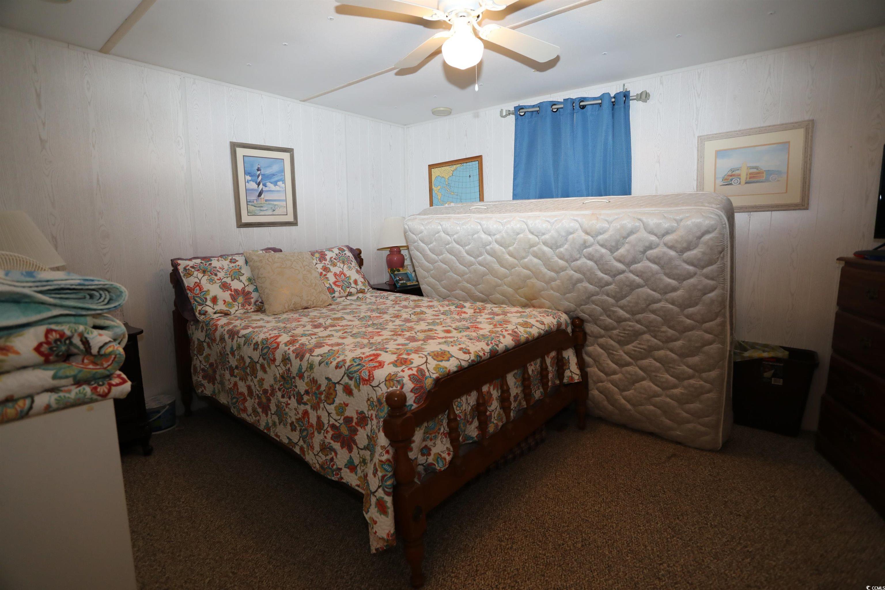 724 1st Street Murrells Inlet, SC 29576 - Photo 8 of 18 Carpeted bedroom with ceiling fan