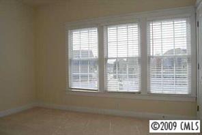 292 Elis Way, Unit 292 Fort Mill, SC 29708 - Photo 8 of 8 a view of an empty room with a window