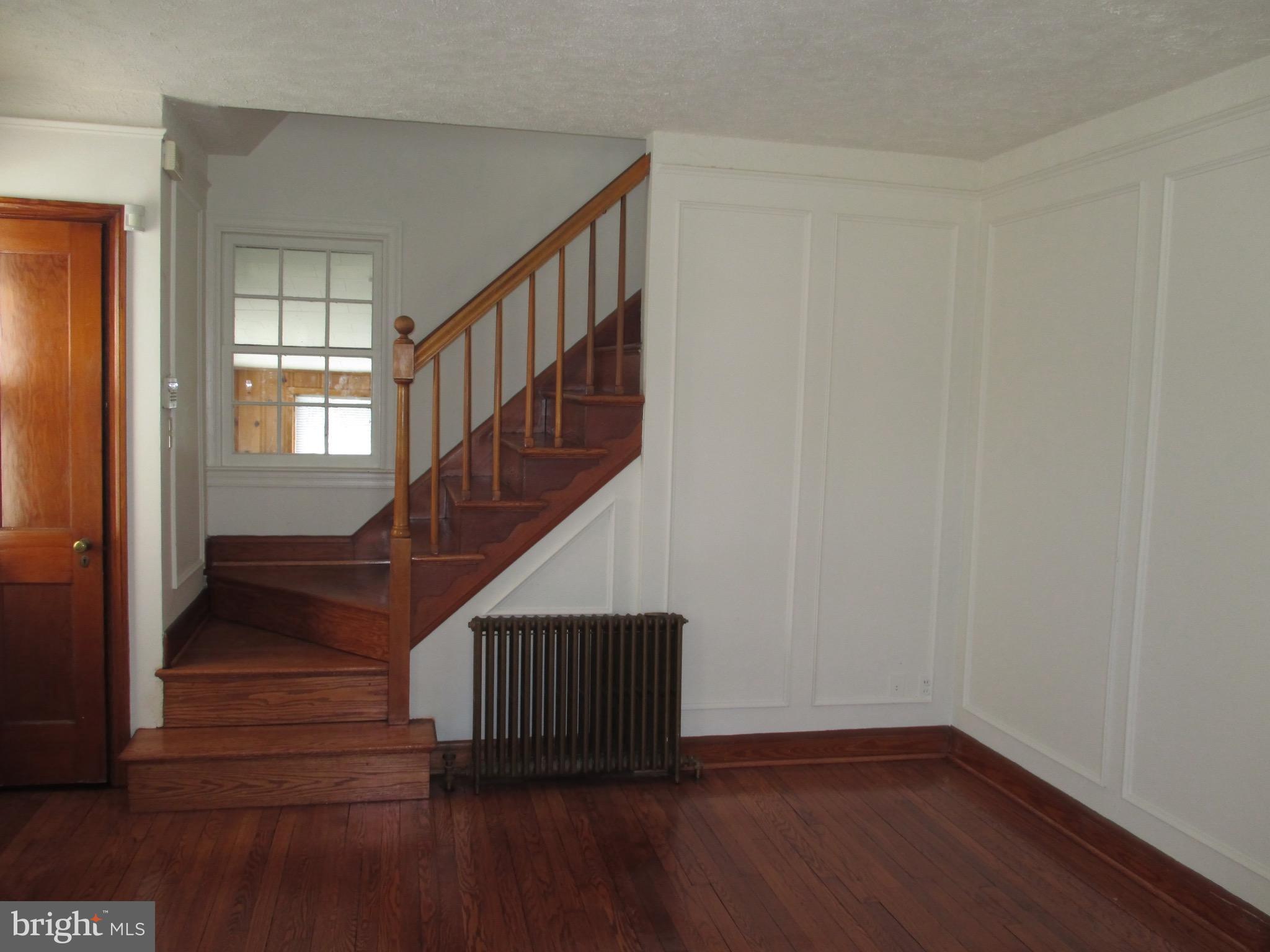 716 Dorchester Road Baltimore, MD 21229 - Photo 10 of 20 a view of entryway with wooden floor