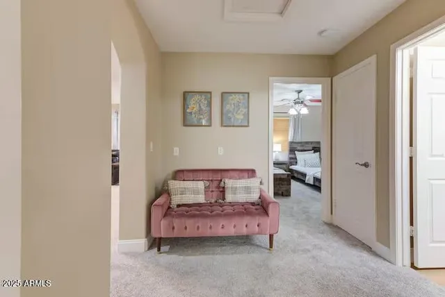 a bedroom with furniture and a window