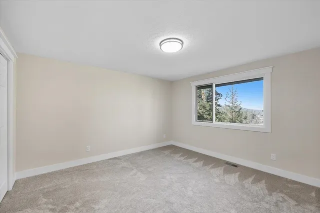 $585,000 | 11815 North King Arthur Drive, Spokane, WA 99218