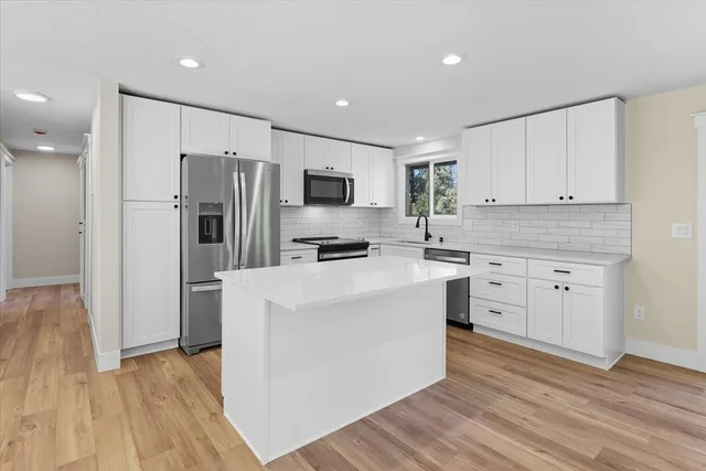 $585,000 | 11815 North King Arthur Drive, Spokane, WA 99218