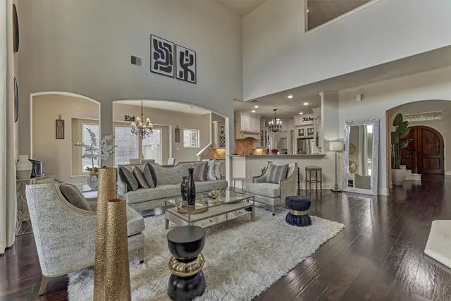 a view of a backyard with large trees