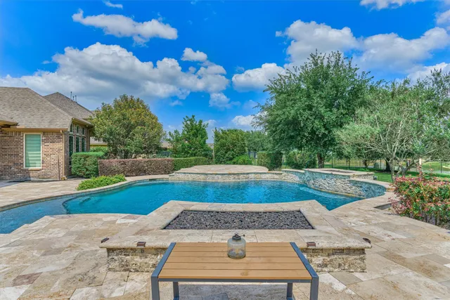 a view of backyard with green space