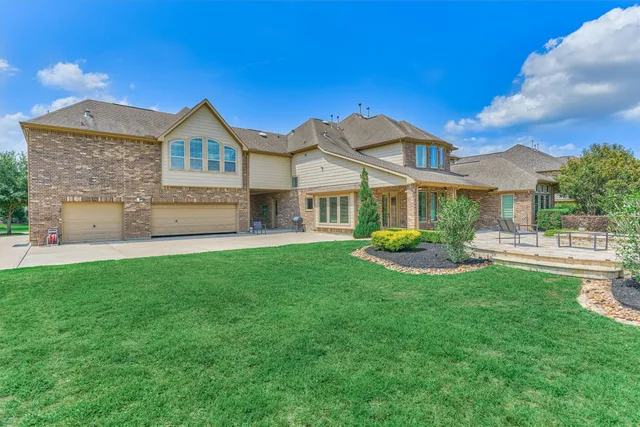 a view of swimming pool with a yard