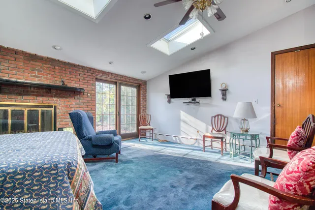 a kitchen with sink a refrigerator and cabinets