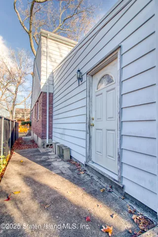 a kitchen with stainless steel appliances granite countertop a sink and a stove