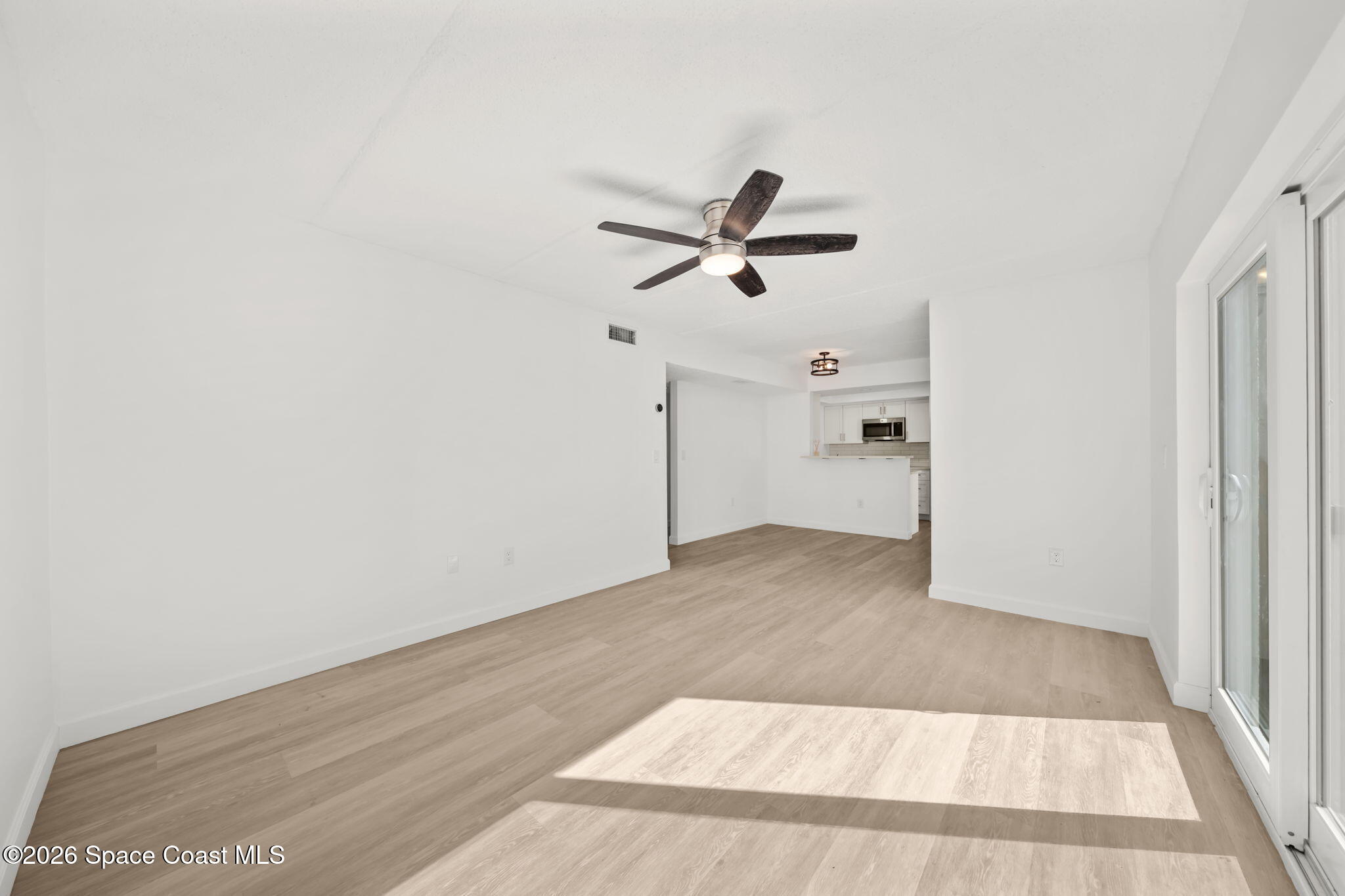 716 Ridge Club Drive Melbourne, FL 32934 - Photo 12 of 40 Seamless flow to patio & living space