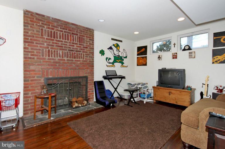 1342 Kalmia Road Northwest Washington, DC 20012 - Photo 6 of 19 Basement with Fireplace