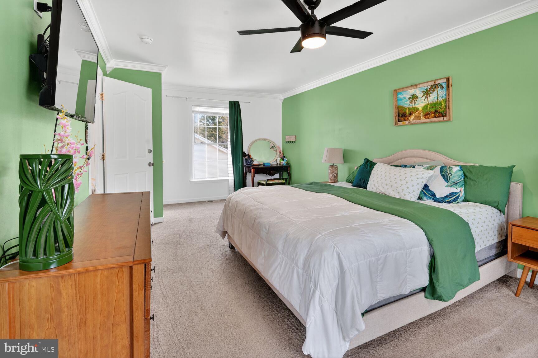 71 Fairground Avenue Taneytown, MD 21787 - Photo 15 of 36 a bedroom with a bed dresser and a window