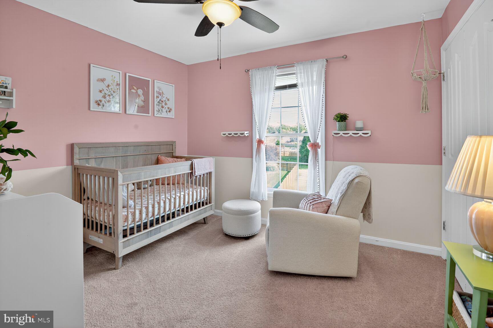 71 Fairground Avenue Taneytown, MD 21787 - Photo 16 of 36 a bedroom with a bed and a couch