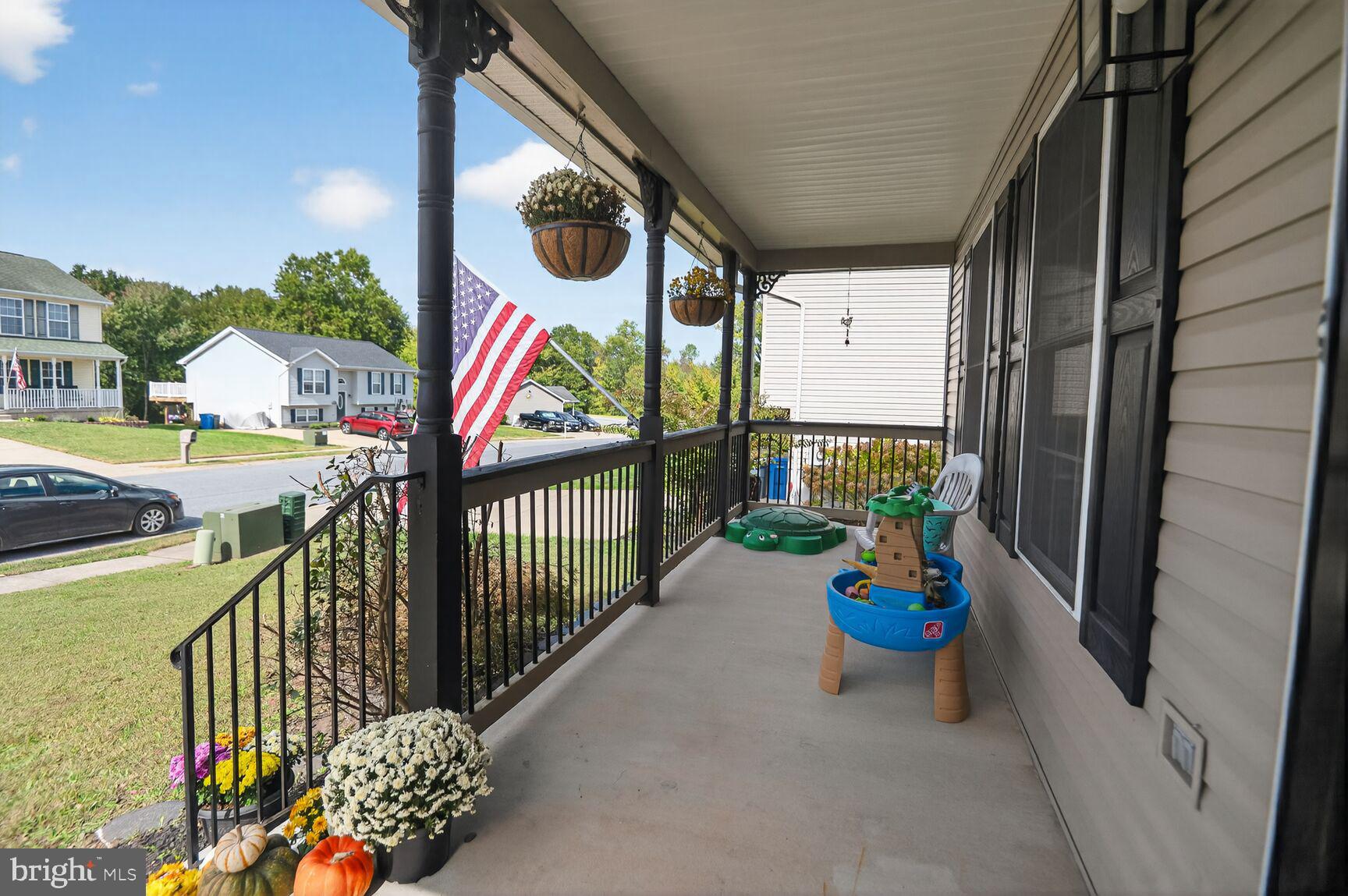 71 Fairground Avenue Taneytown, MD 21787 - Photo 26 of 36 a view of a pathway of a building from a balcony