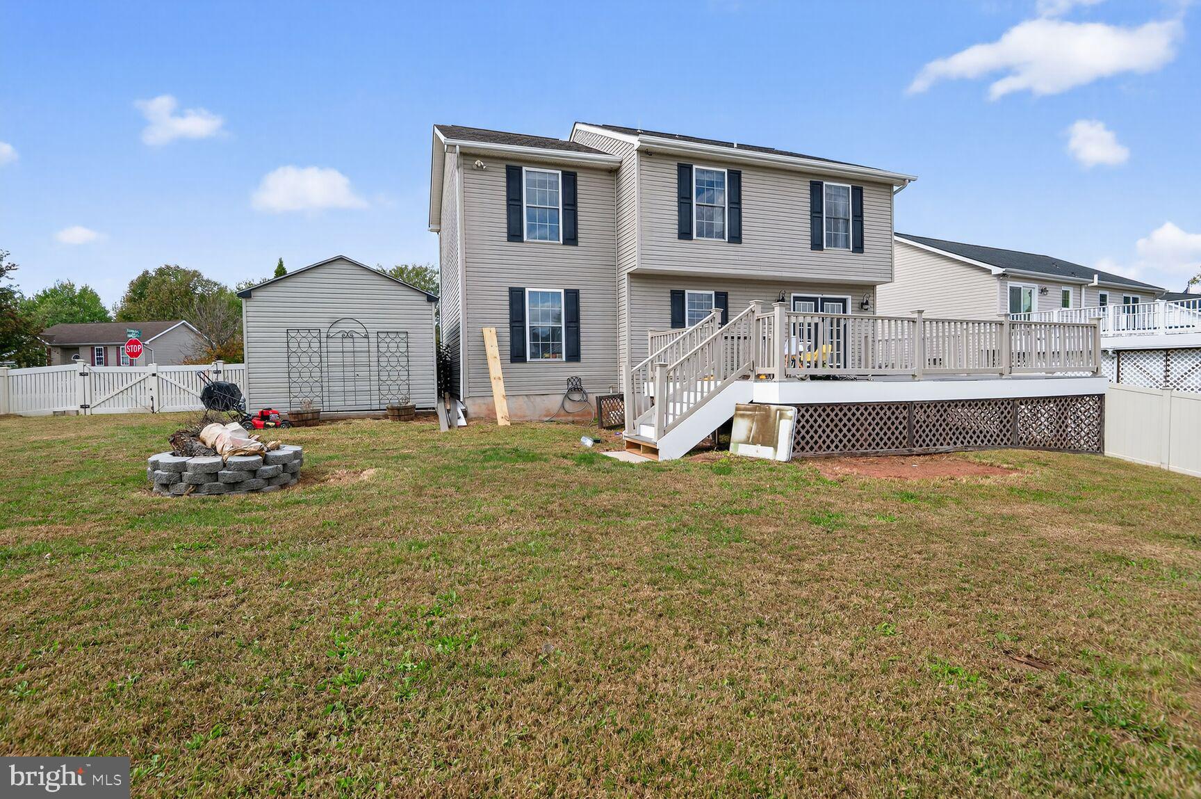 71 Fairground Avenue Taneytown, MD 21787 - Photo 29 of 36 a view of a house with a yard and sitting area