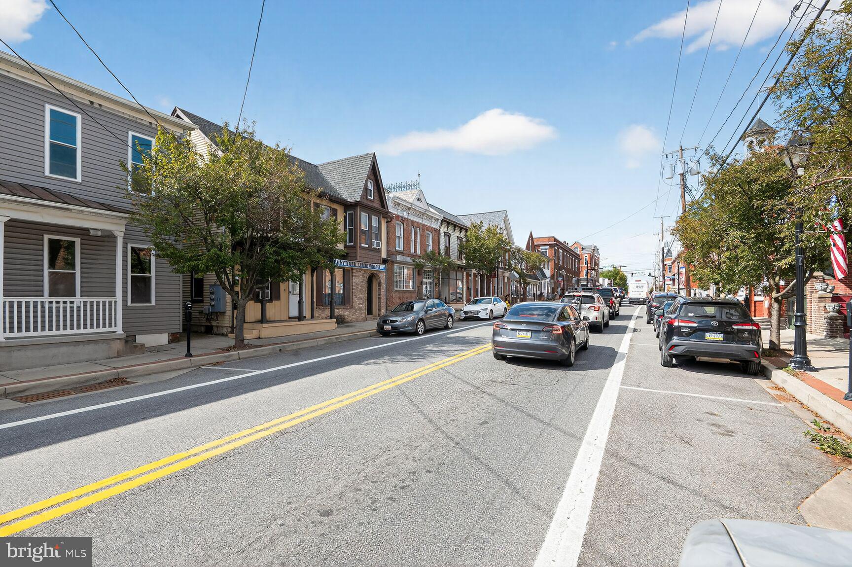 71 Fairground Avenue Taneytown, MD 21787 - Photo 31 of 36 a view of a cars park in front of a building