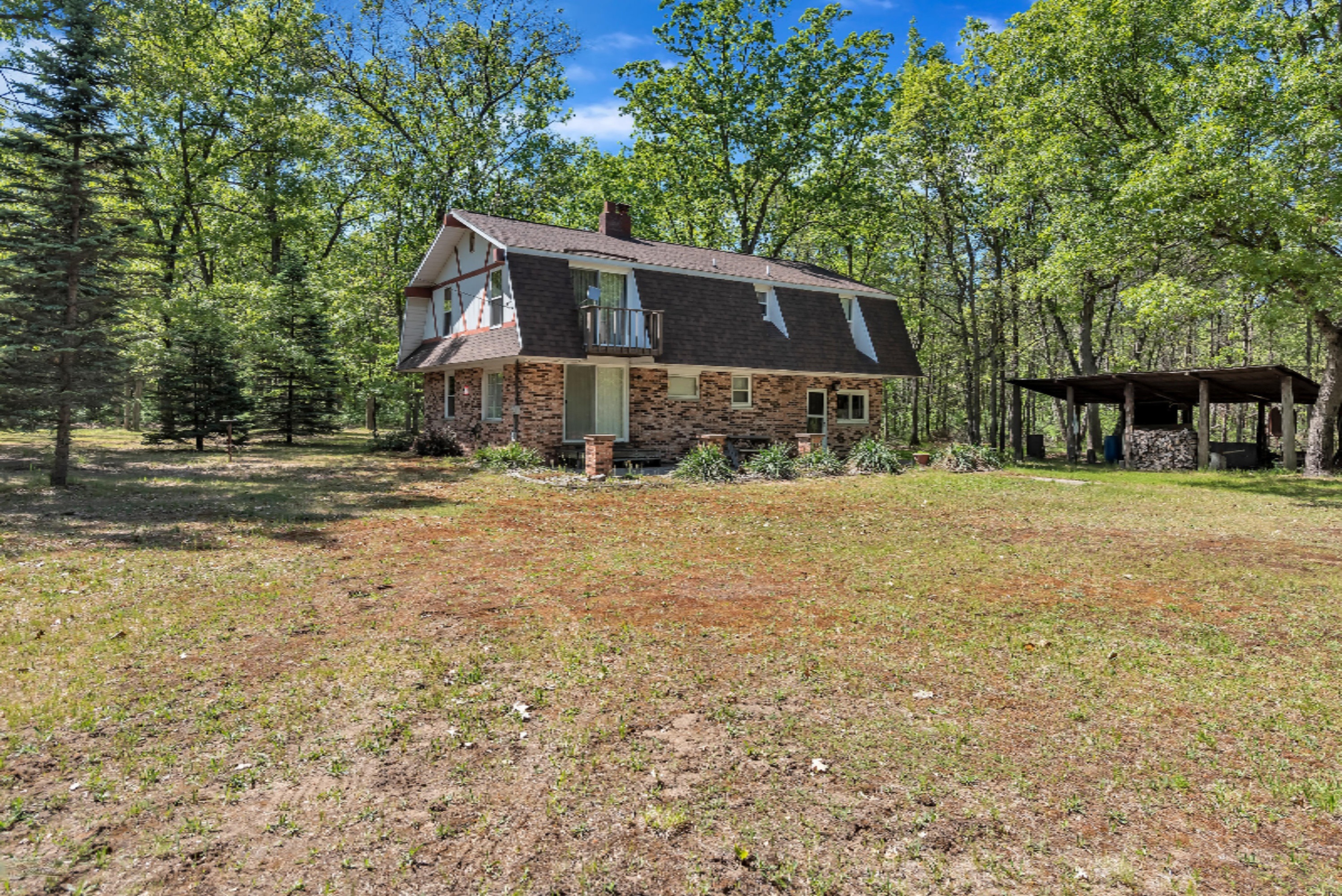 511 Huff Road Manistee, MI 49660 - Photo 2 of 29 NW back view