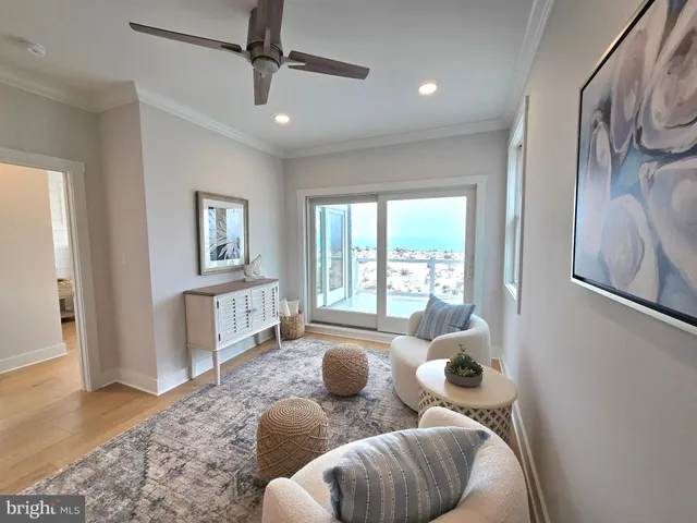 a spacious bedroom with a large bed and a fireplace