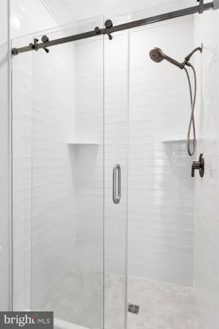 a view of a house with a door and wooden floor