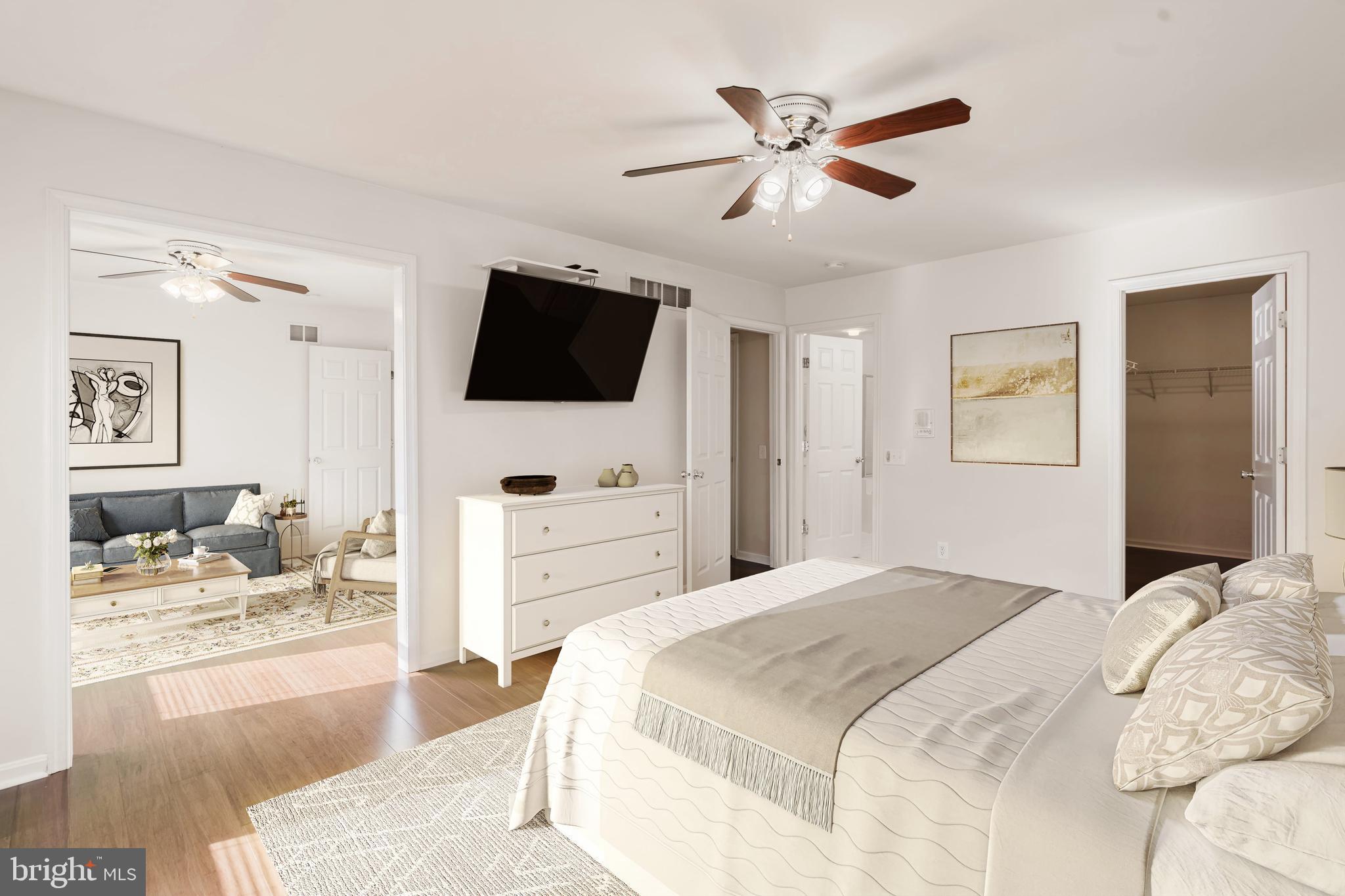 33 Hummingbird Lane Newark, DE 19711 - Photo 25 of 53 a bedroom with a bed window and a flat screen tv