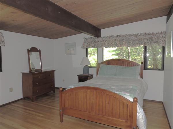 28 Sunset Road Carlisle, MA 01741 - Photo 5 of 10 a living room with furniture and a wooden floor