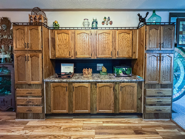 38569 North Sheridan Road, Unit 390 Beach Park, IL 60099 - Photo 7 of 28 a view of a closet with wooden floor