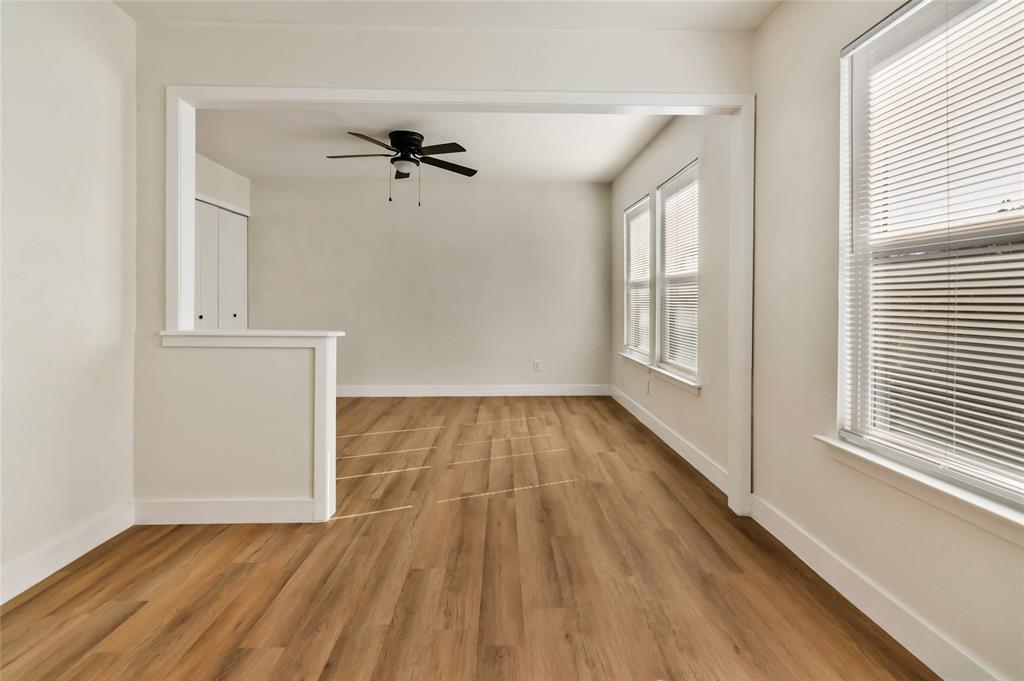 3708 Spring Meadow Lane Flower Mound, TX 75028 - Photo 29 of 39 wooden floor in an empty room with a window