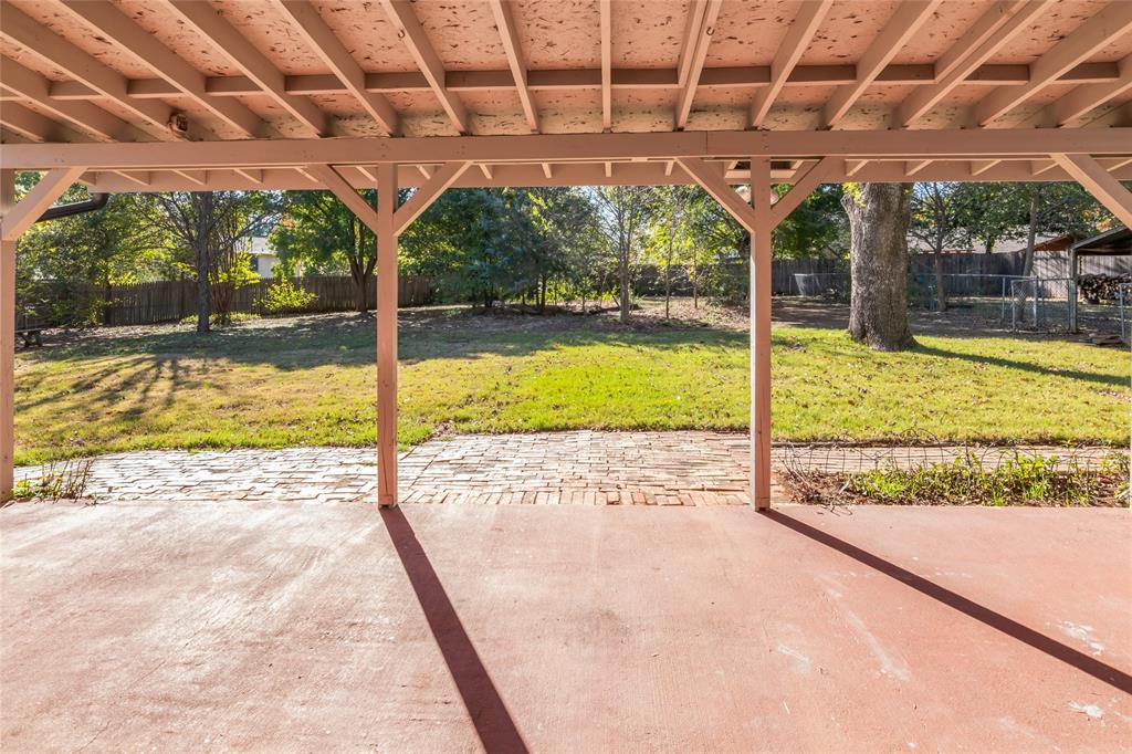 3708 Spring Meadow Lane Flower Mound, TX 75028 - Photo 32 of 39 a view of a swimming pool with a porch