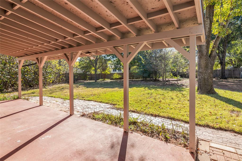 3708 Spring Meadow Lane Flower Mound, TX 75028 - Photo 33 of 39 a view of a swimming pool with a porch