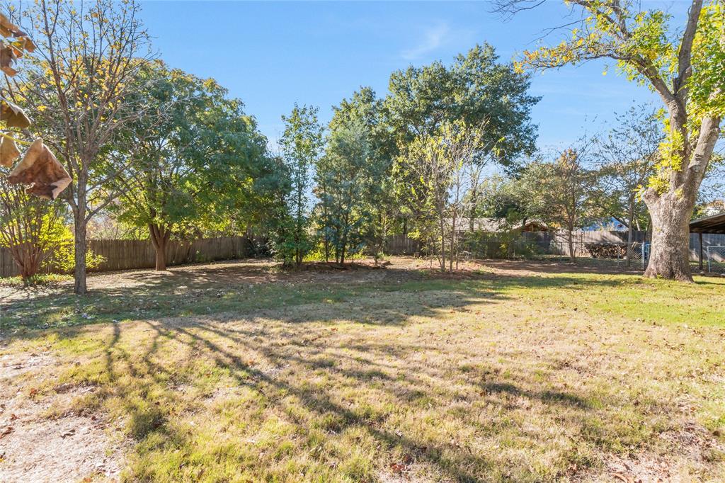 3708 Spring Meadow Lane Flower Mound, TX 75028 - Photo 34 of 39 a view of yard with large trees