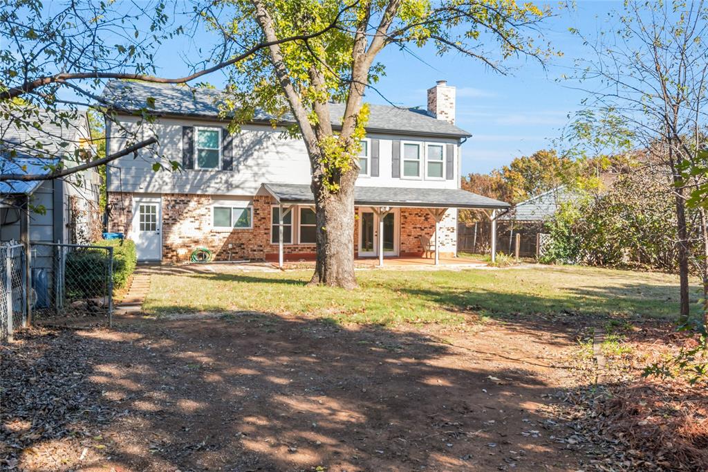 3708 Spring Meadow Lane Flower Mound, TX 75028 - Photo 36 of 39 a view of a house with a yard